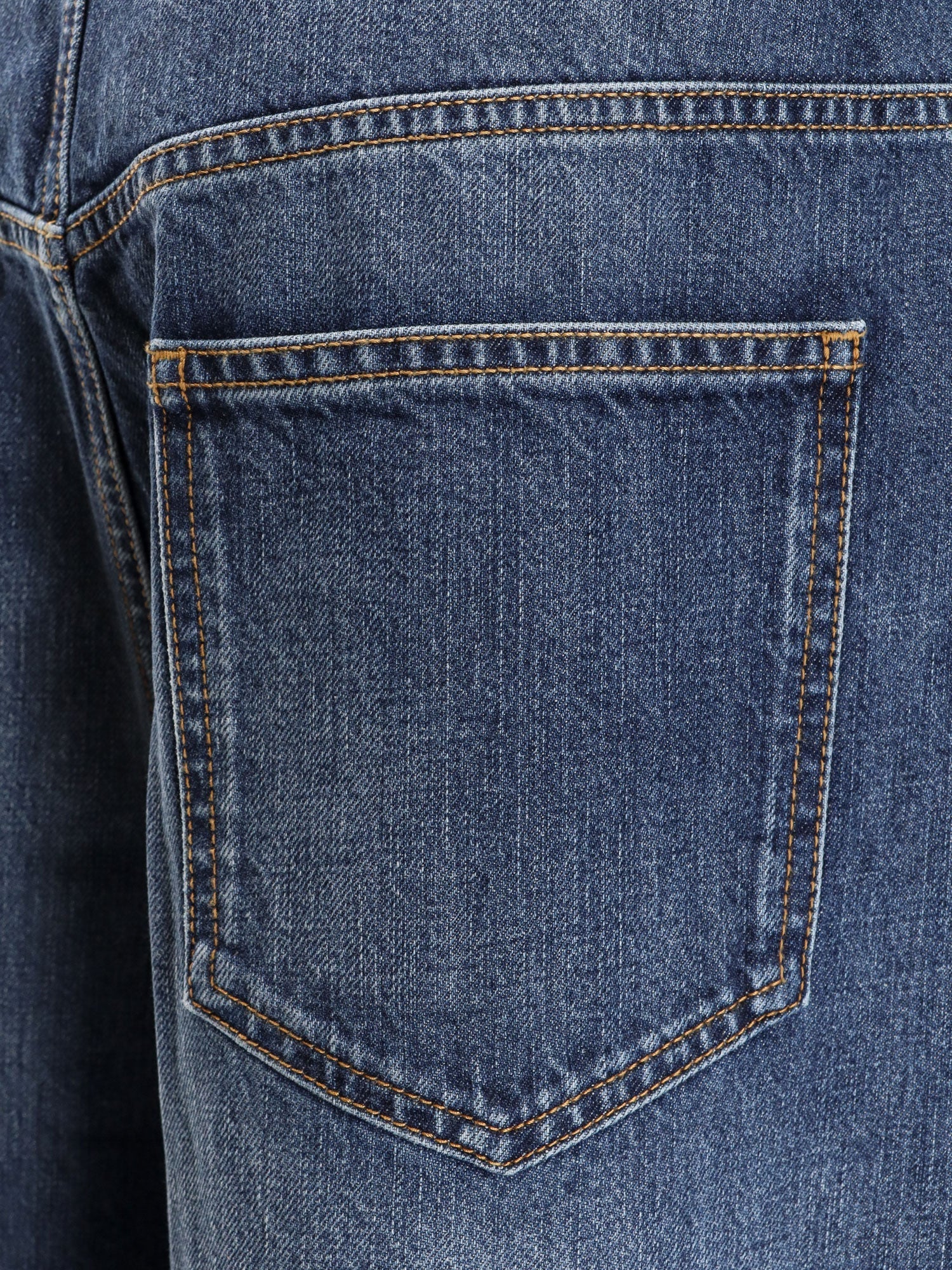 Givenchy Twisted Stone-Washed Denim Jeans