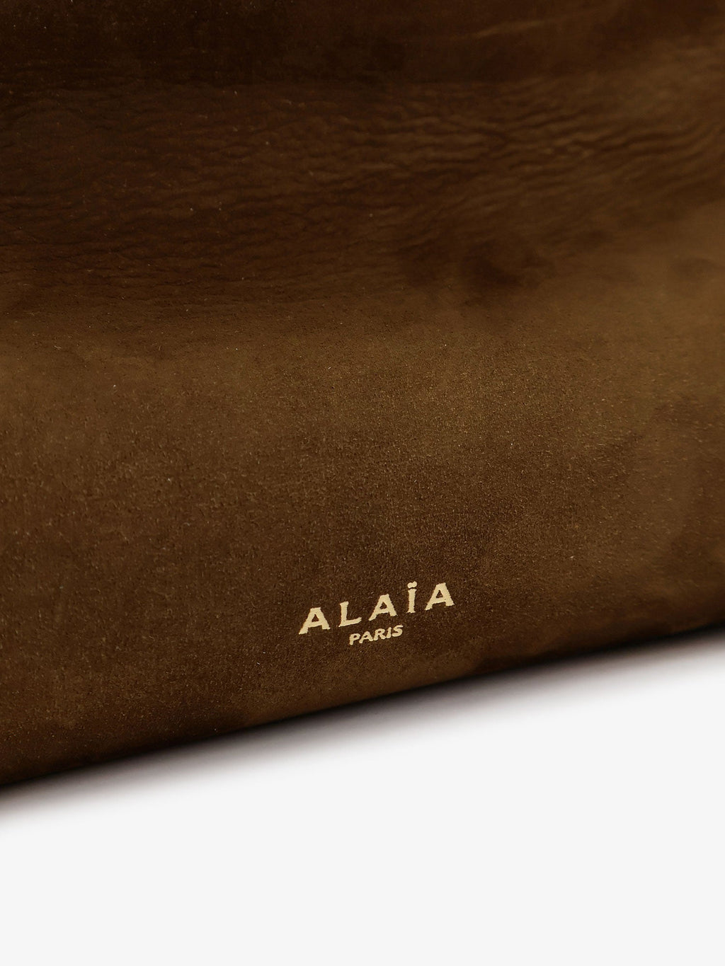 Alaia East West Leather Shoulder Bag With Engraved Logo Lettering